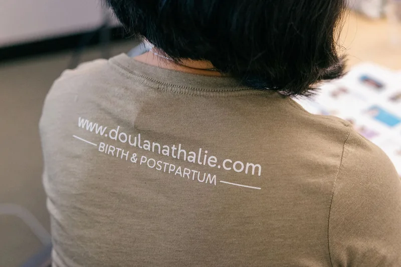 Doula Nathalie company shirt